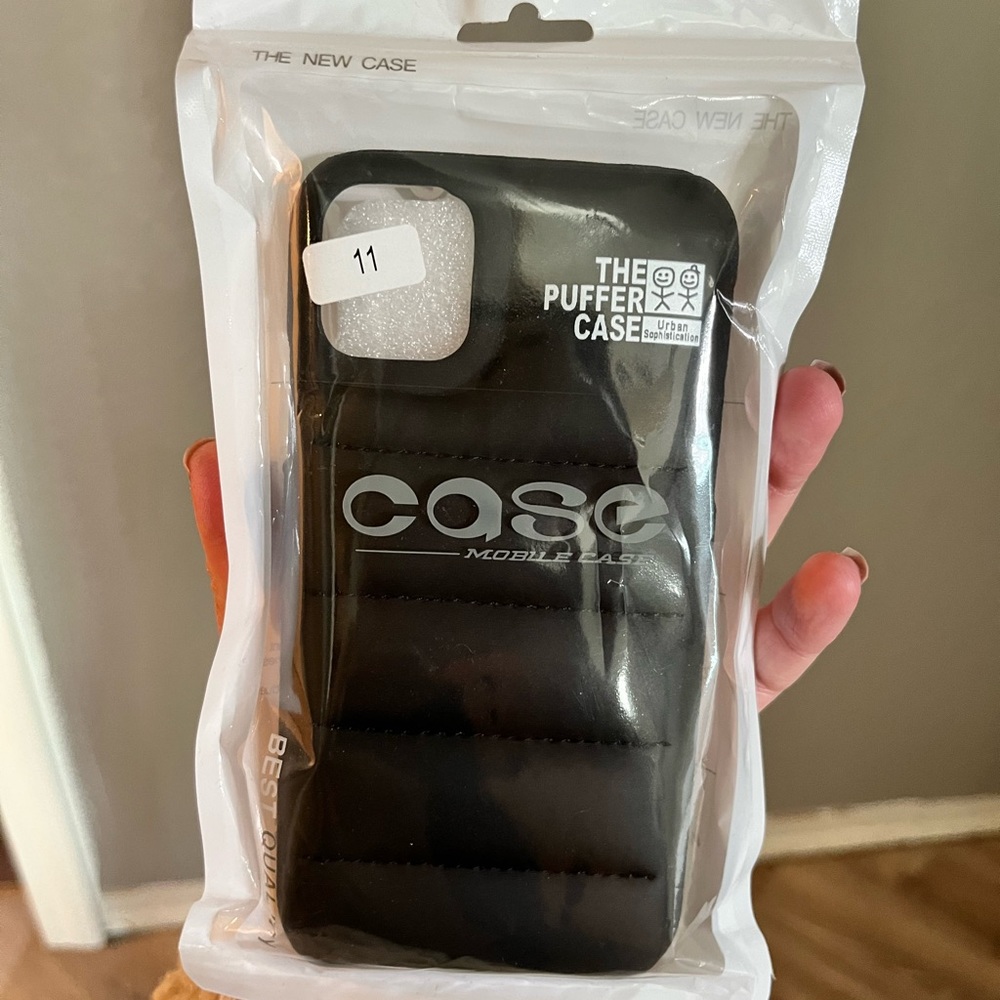 Black puffer case